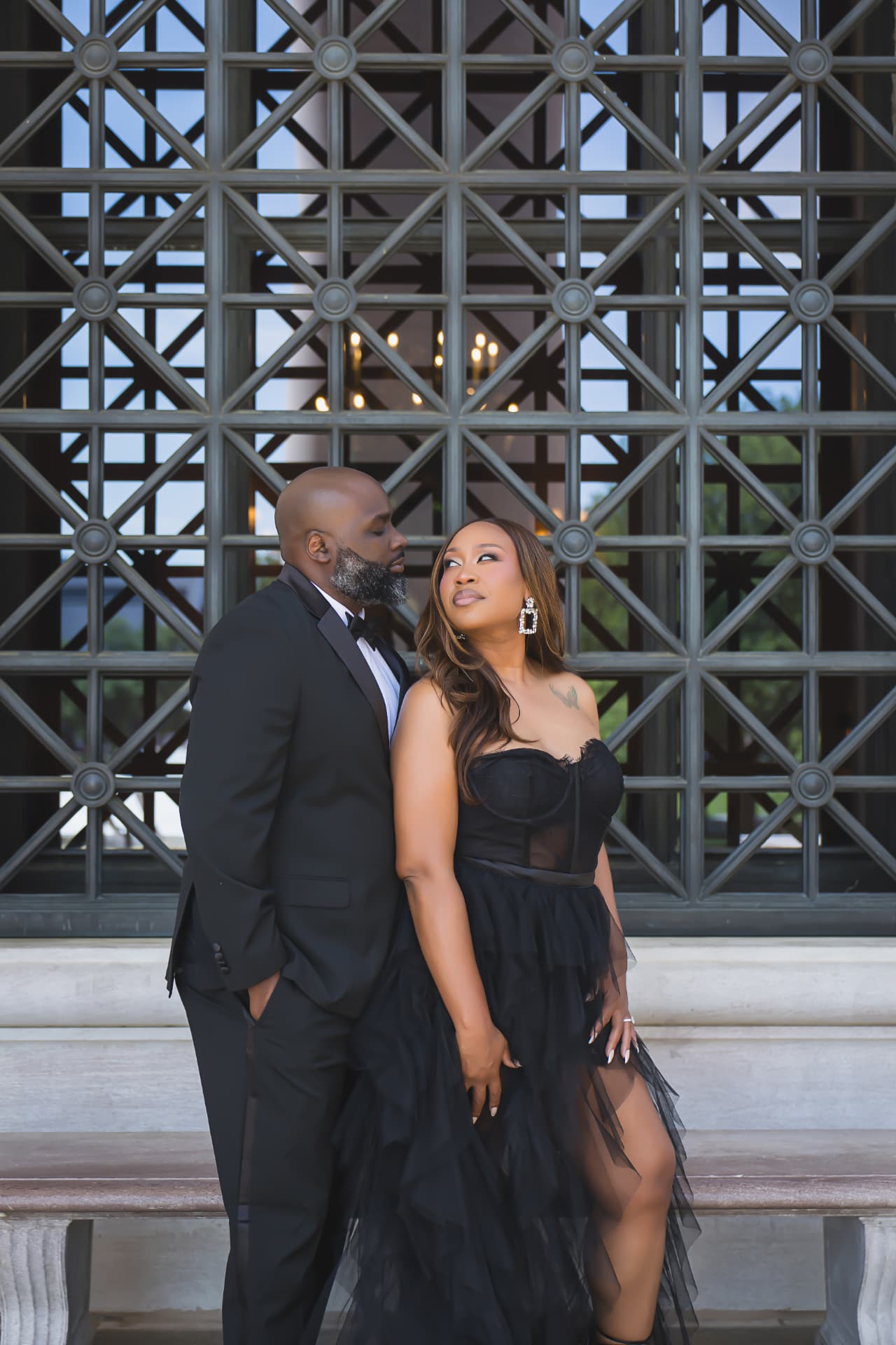 Jarron and Marissa in black formal attire during their engagement session